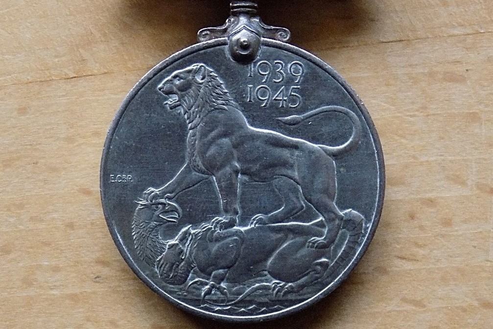 Post-A-Coin-Or-Medal-Devoted-To-A-Military-Subject