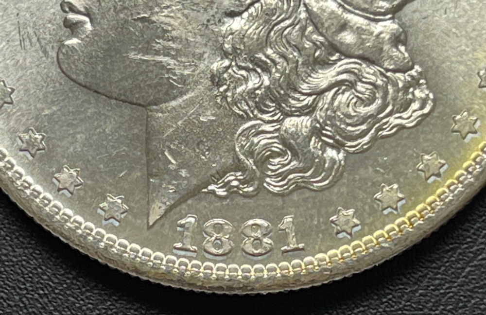 1881-S-Morgan---What-Is-Happening-Under-Date-And-Stars?
