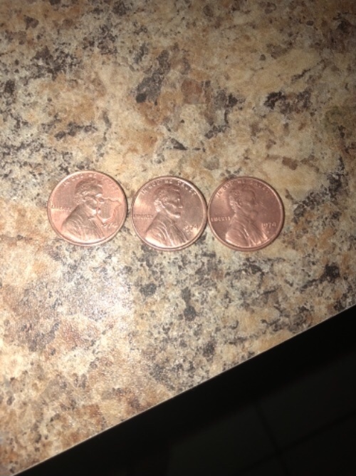 Help-Identifying-Stamp-On-1974-Penny