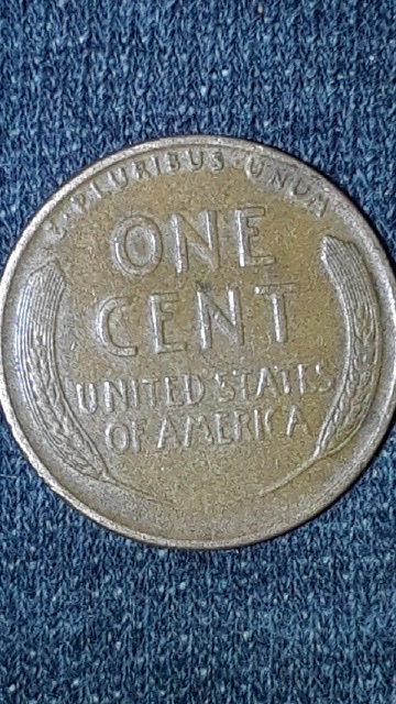 1940-One-Cent-Coin-Few-Error.-Mint-Under-Liberty-?