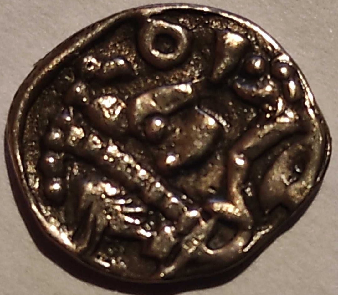 Strange-Small--Gold-Coin