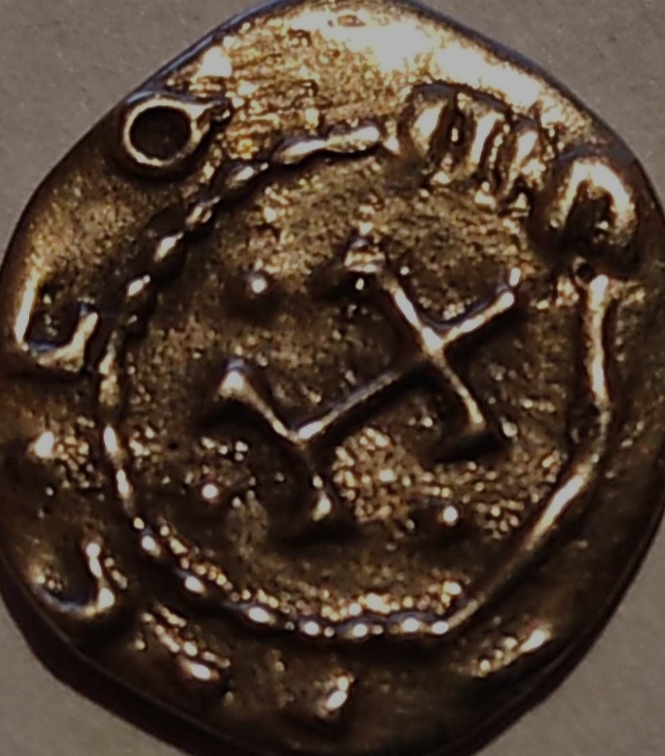 Strange-Small--Gold-Coin