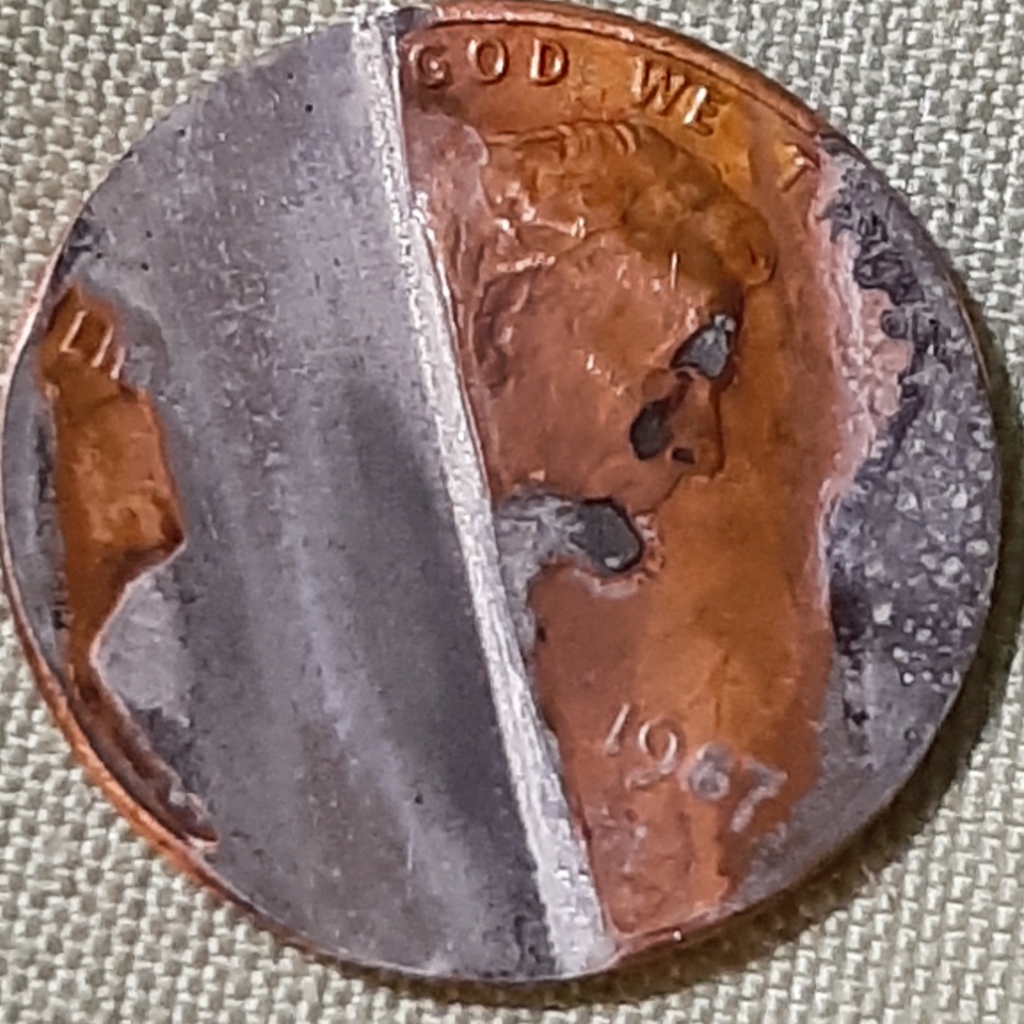 1987-Penny-With-Half-Of-The-Coin-Face-Missing-&-Just-Plain-Silver,-Error?