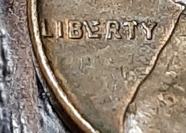 1960-D-Penny-Looks-Like-An-L-Over-The-E-In-Liberty