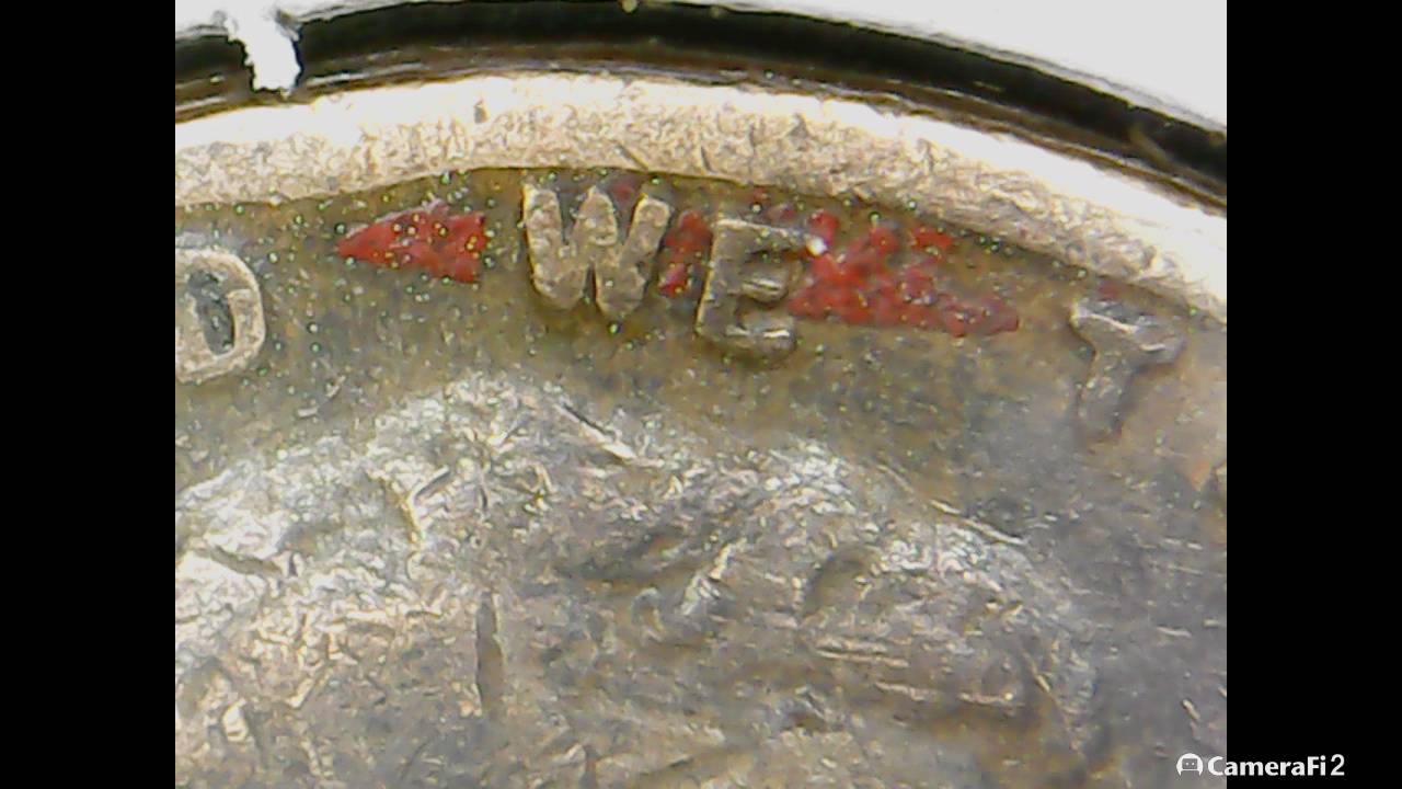 Red-Arrow-And-Xl-On-Wheat-Penny?