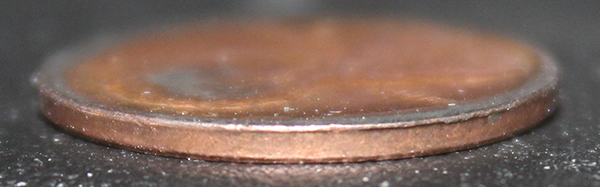 Two-80's-Lincoln-Cents.-Cut-Planchet?-Melted?