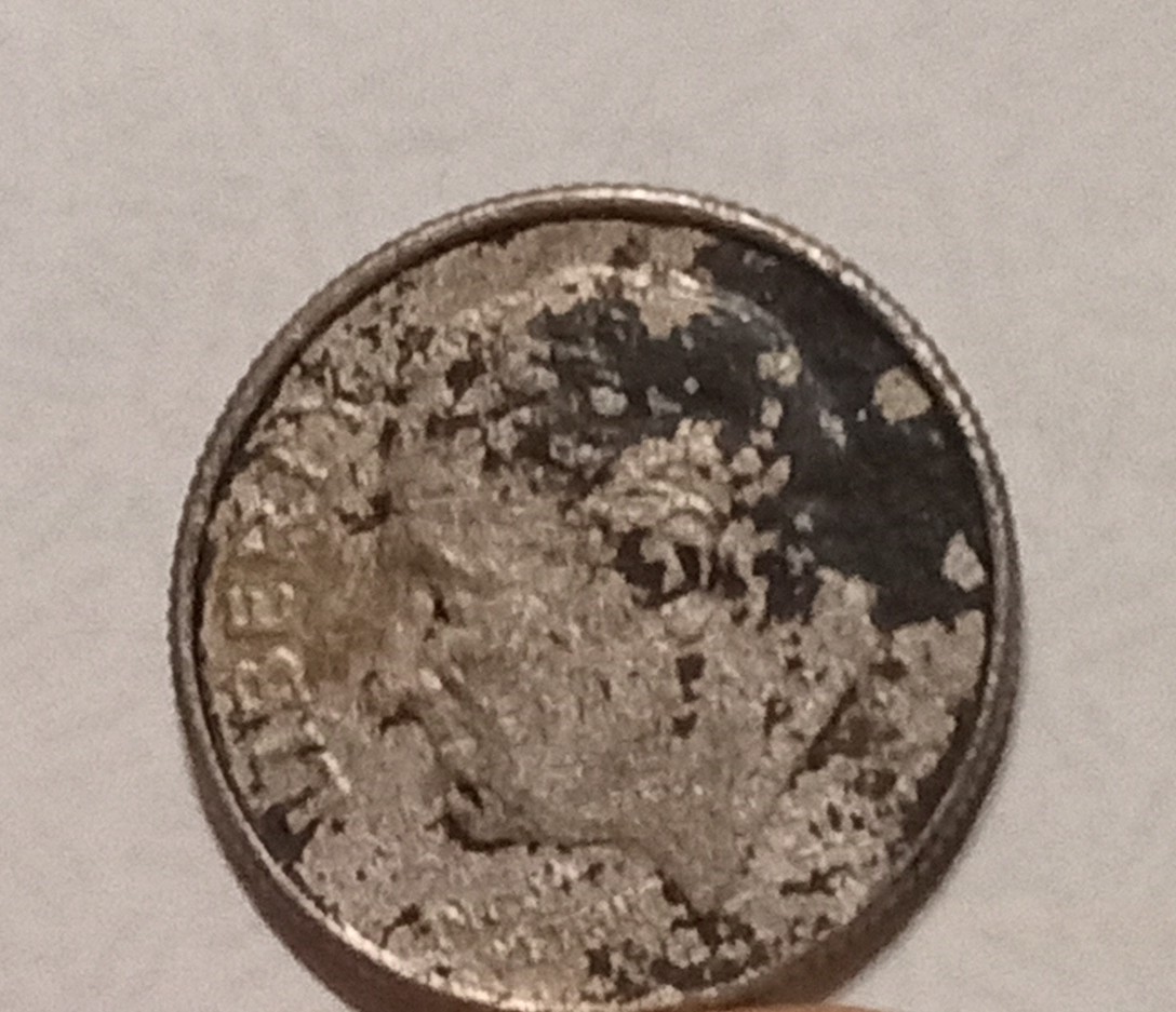 20?-Maybe-Dime-Is-Missing-Rim-But-Still-Has-Reed-Marks