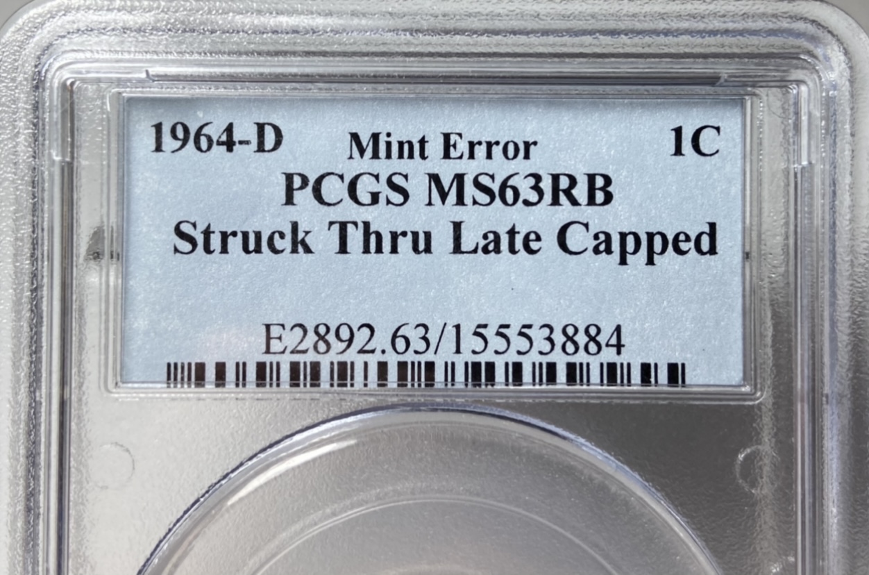 1964-D-LMC-Struck-Through-Capped-Die-PCGS-MS-63RB