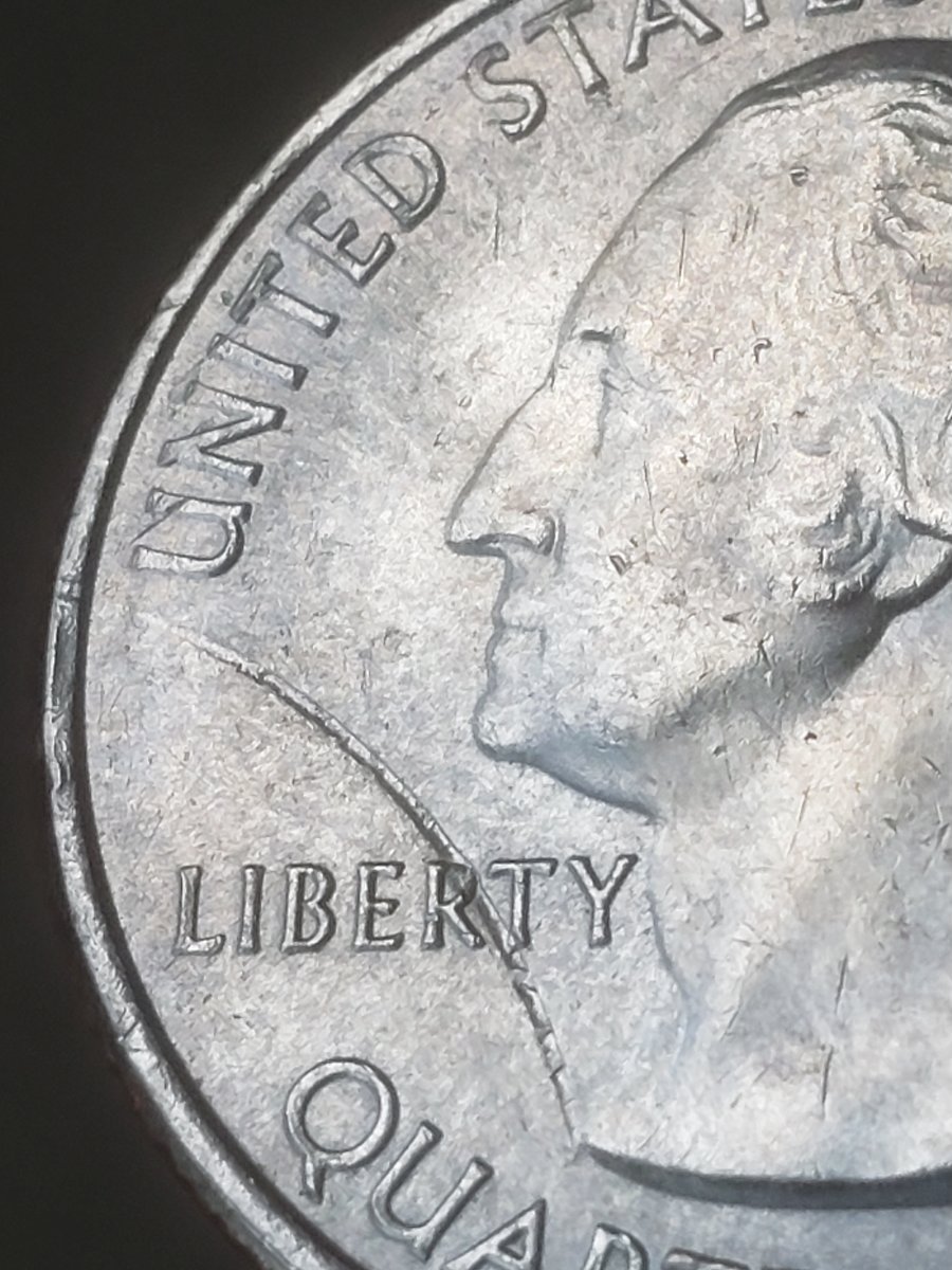 2018-Quarter-Struck-Through-Large-Rim-Burr