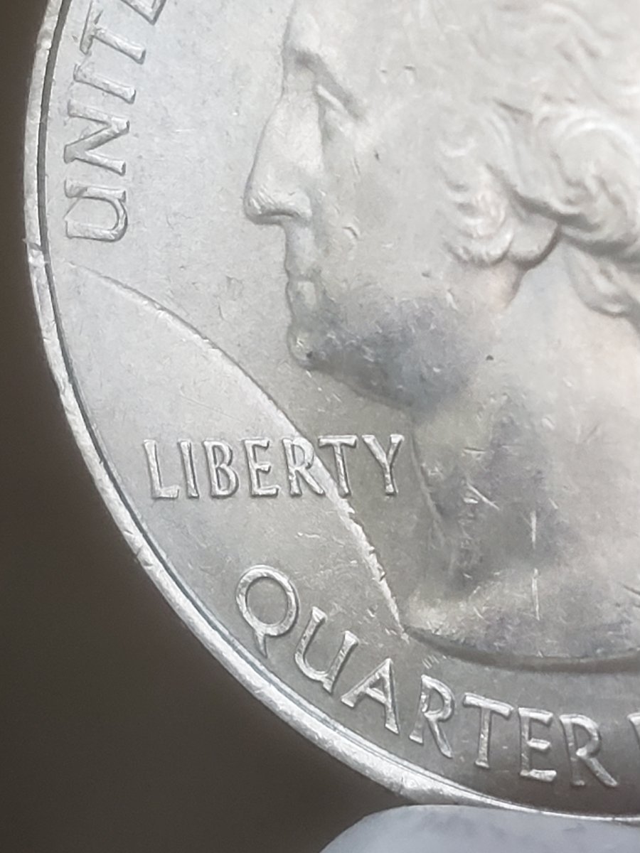 2018-Quarter-Struck-Through-Large-Rim-Burr