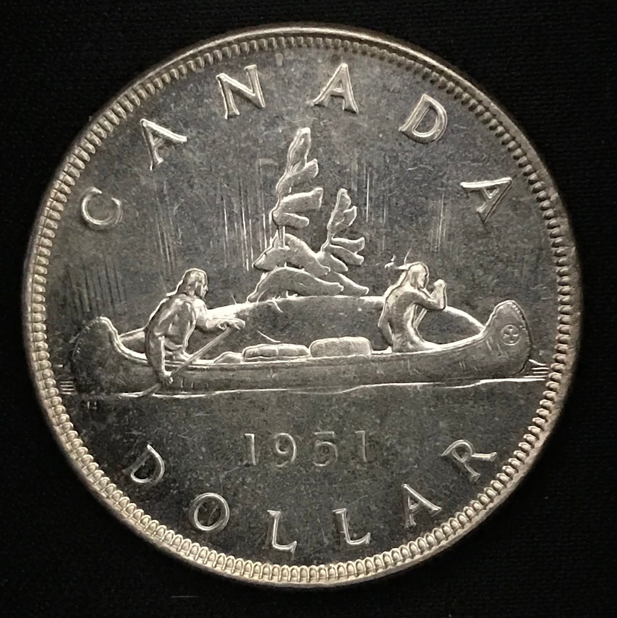 Looking-For-Info:-1951-Silver-Dollar-With-Unusual-Features