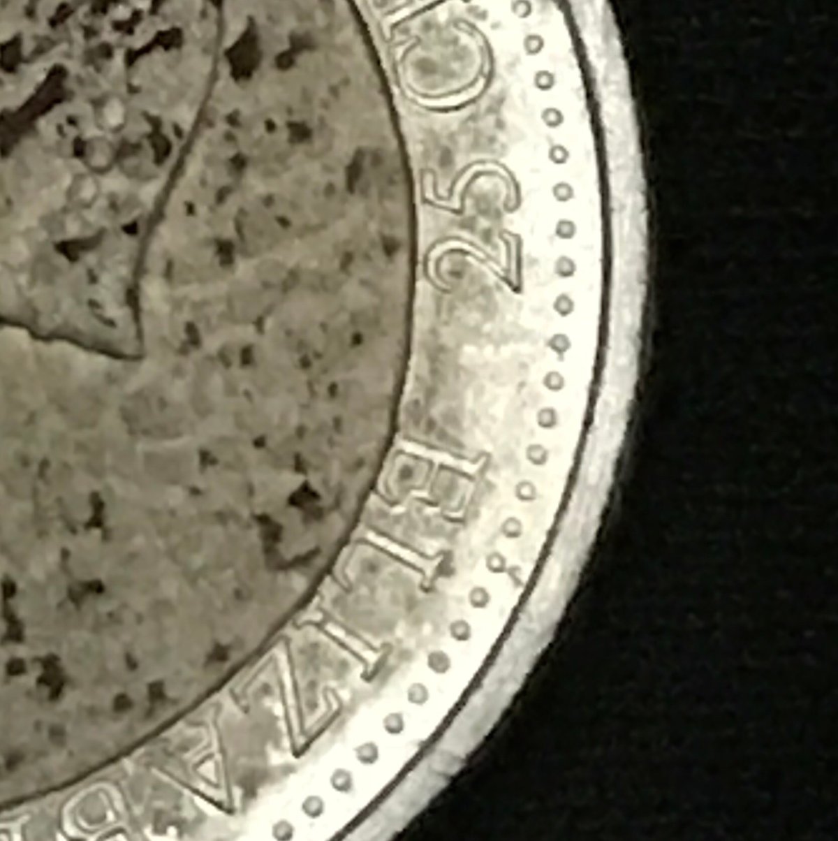 Help-With-Possible-Error:-Canadian-1999-Quarter