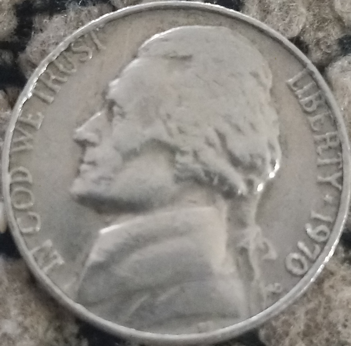 Is-This-1970-D-Nickel-An-Error?--The-Outer-Rim-Is-Overlaying-The-Letters-In-God-We-Trust-On-The-Fron