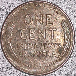 1955-Penny-With-Extra-Metal-Under-Chin.