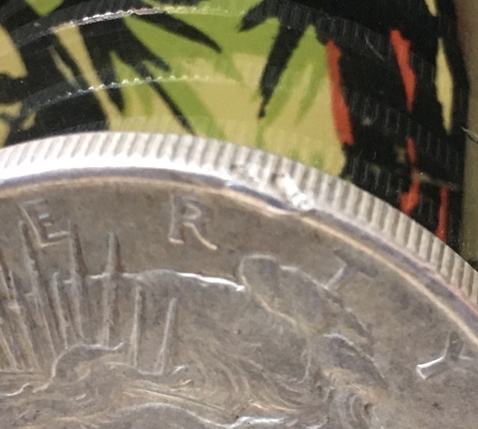 Need-Opinion---Peace-Coin-6:-Edge-Anomaly...-Mint-Error-Or-Damage?-Value?