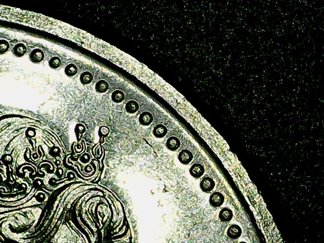 1977-Silver-Dollar-With-Attached-Jewels?