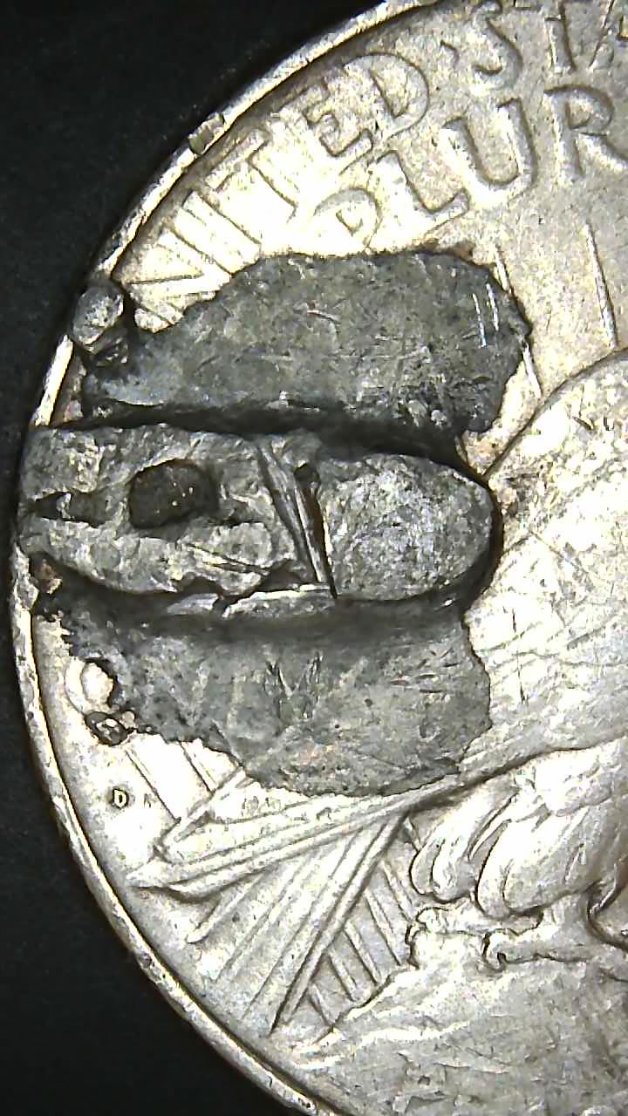 1922-D-Peace-Dollar-Coin-With-Extra-Metal-On-Reverse