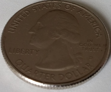2011-D-Quarter-Olympic-With-All-Nickel-Perferated-Edge