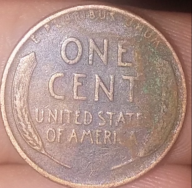1950-Something-D-Lincoln-Penny-Possible-Struck-Through-Grease?