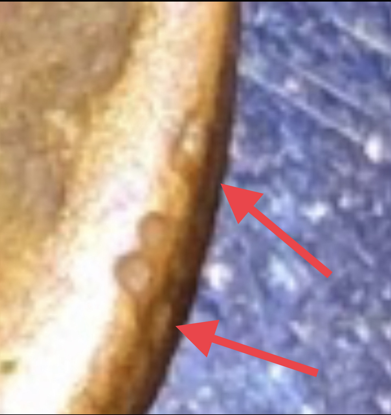 1911-Wheat-Penny-With-Indentation-Of-Another-Penny?