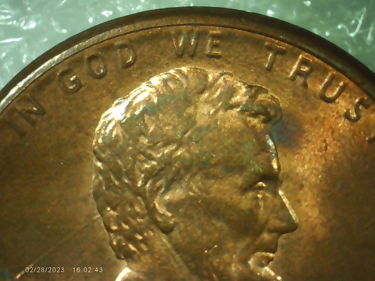 1990-P-Red-Penny-With-Long-Die-Break-On-Front-Going-From-E-Thru-His-Head
