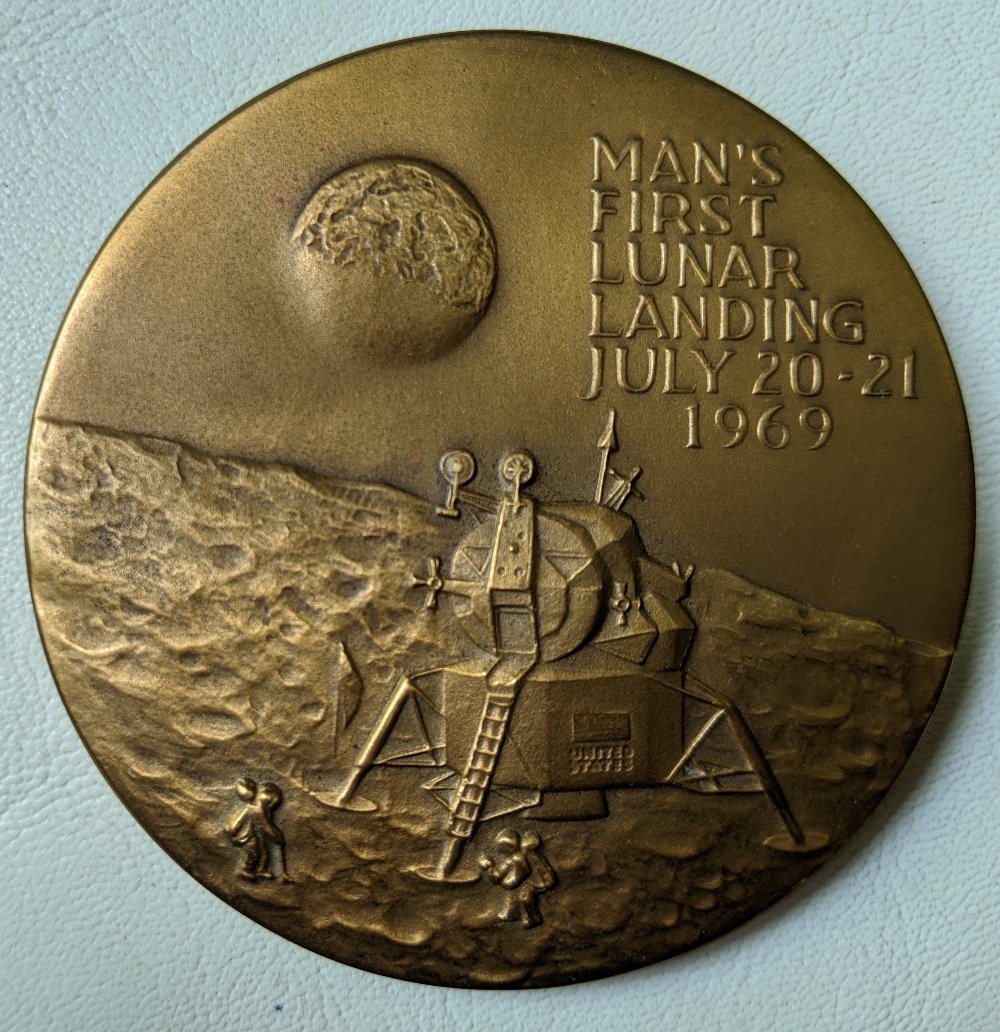 Post-A-Coin-Or-Medal-Related-To-Space-Travel.