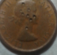 Opinions-On-A-1964-Canadian-Penny,-Error-Or-Damaged?