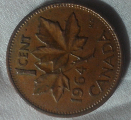 Opinions-On-A-1964-Canadian-Penny,-Error-Or-Damaged?