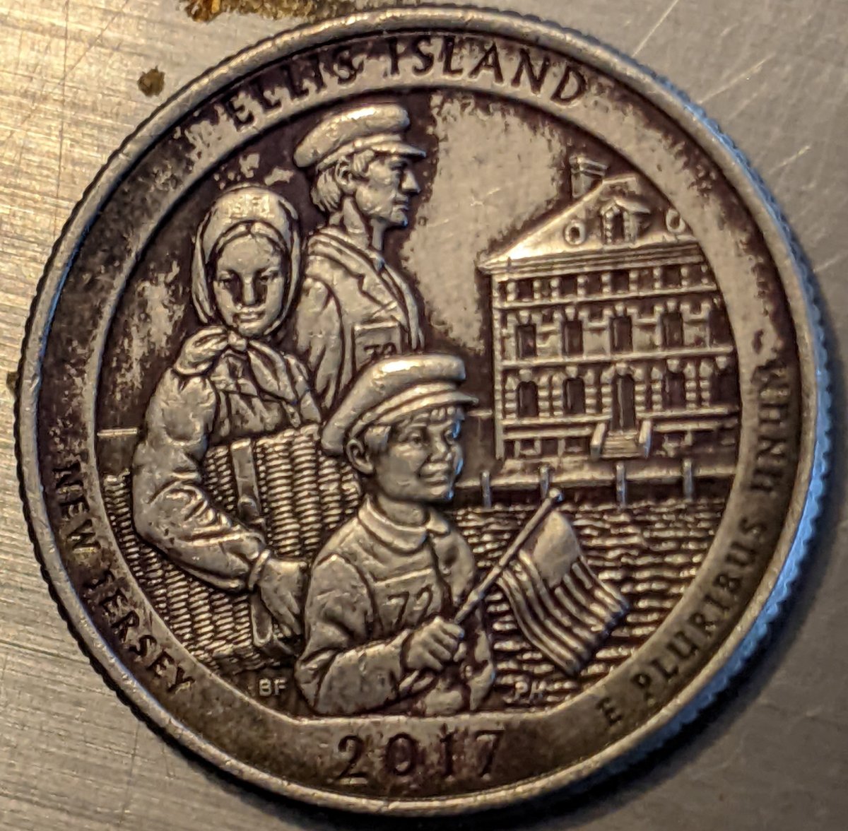 2017-Ellis-Island-Quarter-Red-Not-Paint