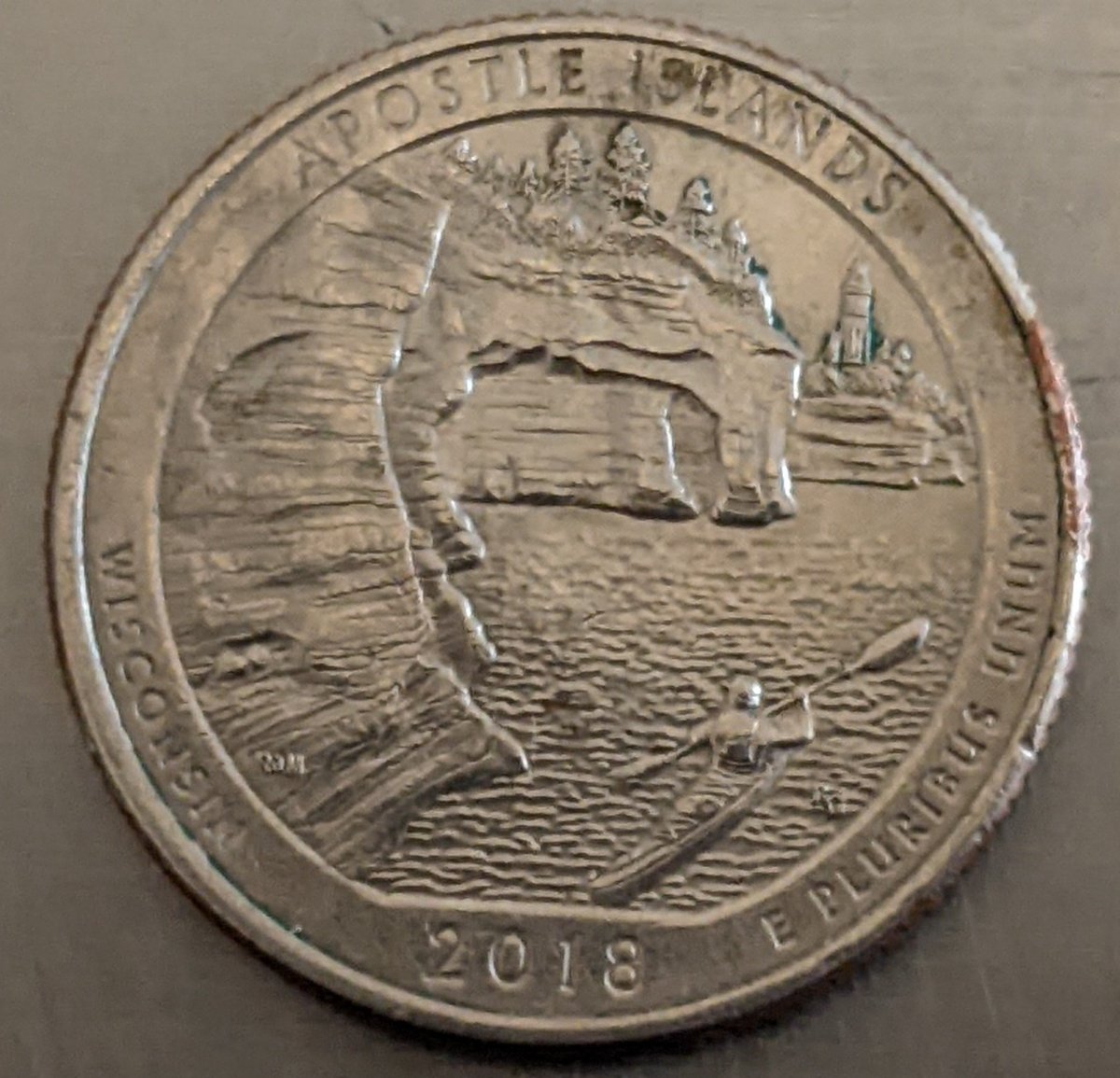 2018-Quarter-Mad-On-The-Obverse-Struck-Through-Retained-Copper-Foil-On-The-Reverse?