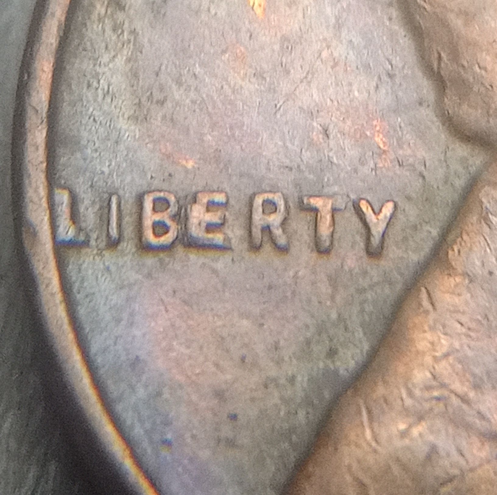 1957-Wheat-Penny.--The-E-In-Liberty-Is-Different