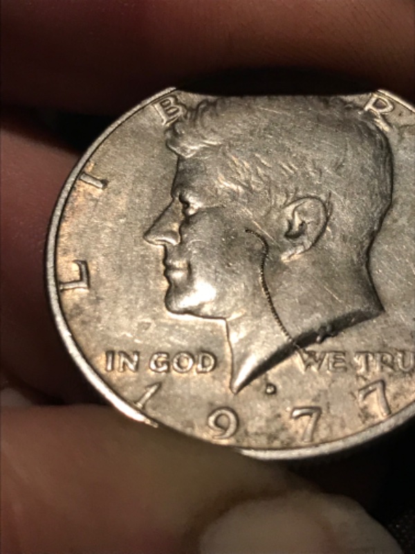 1977-Kennedy-Half-Dollar-With-Really-Cool-Struck-Through-Error-If-Not-I'm-Still-Keeping-It