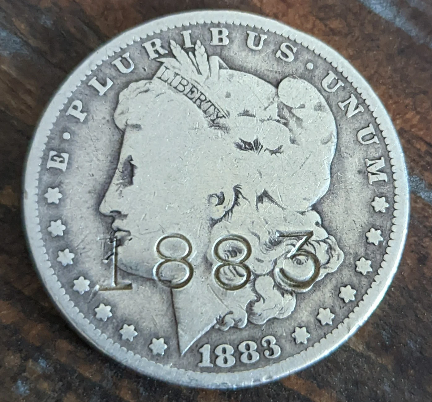 Stamp-On-Morgan-Silver-Dollar-1883?