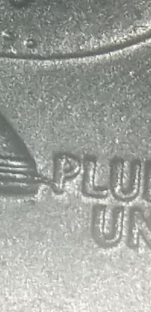 What-Is-This-Line-Connecting-The-Bell-And-The-P-In-Pluribus