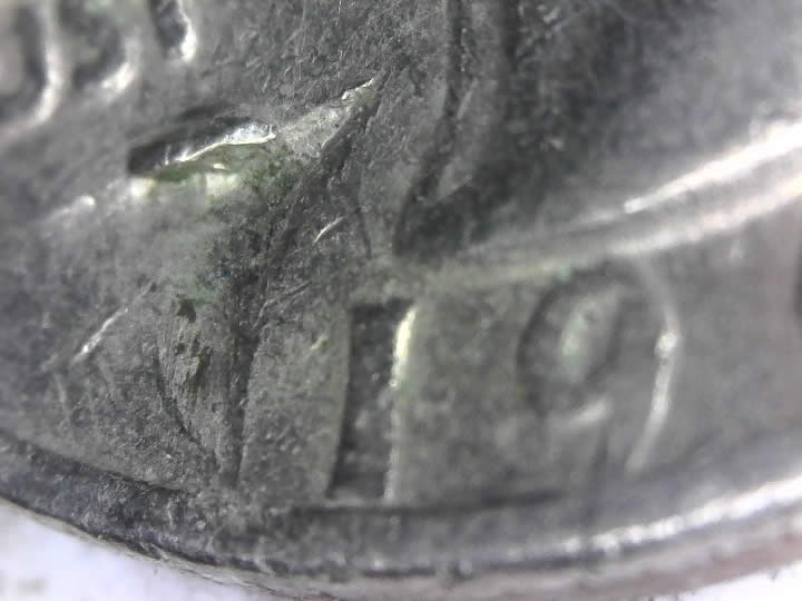 1966-Quarter-With-Odd-Damage