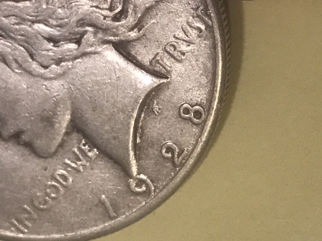 Help!-1928-Peace-Dollar---Real-Or-Altered?