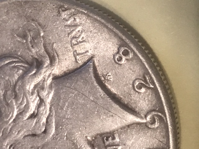 Help!-1928-Peace-Dollar---Real-Or-Altered?