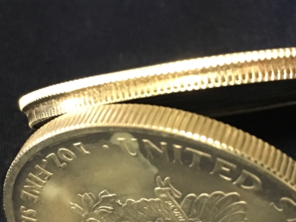 2004-Silver-Eagle-Error:-2-Diameters-On-The-Same-Coin