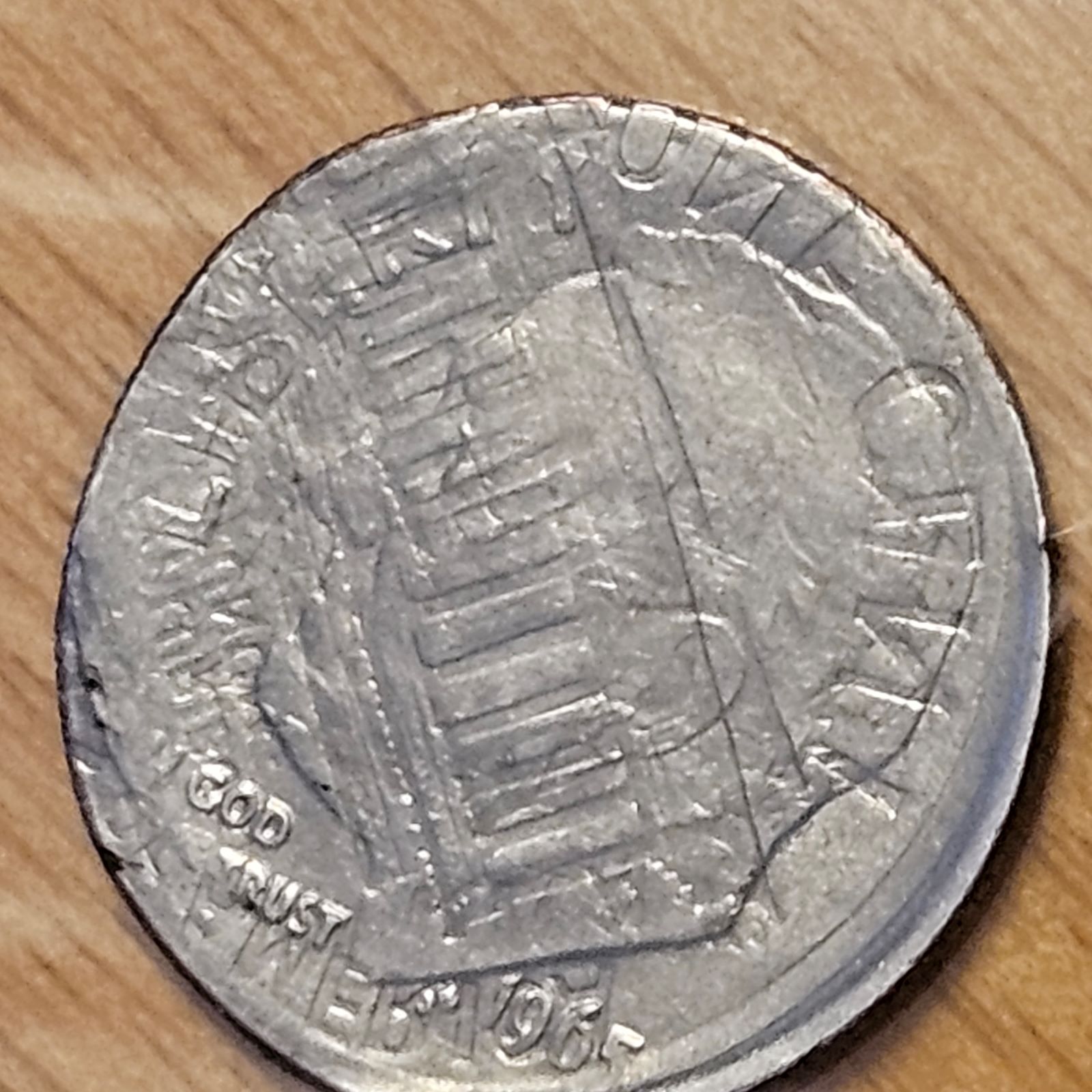 Need-Help-With-A-1965-Roosevelt-Dime-That-Has-A-Reverse-Of-A-Penny-Across-His-Face.