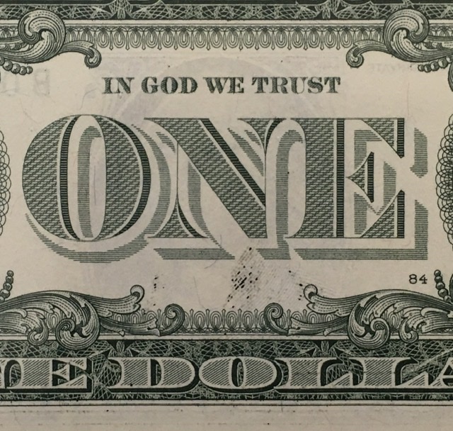 Dollar-Bill-With-A-Ink-Transfer-Smear
