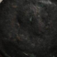 Unknown-Head-On-Very-Old-Coin.