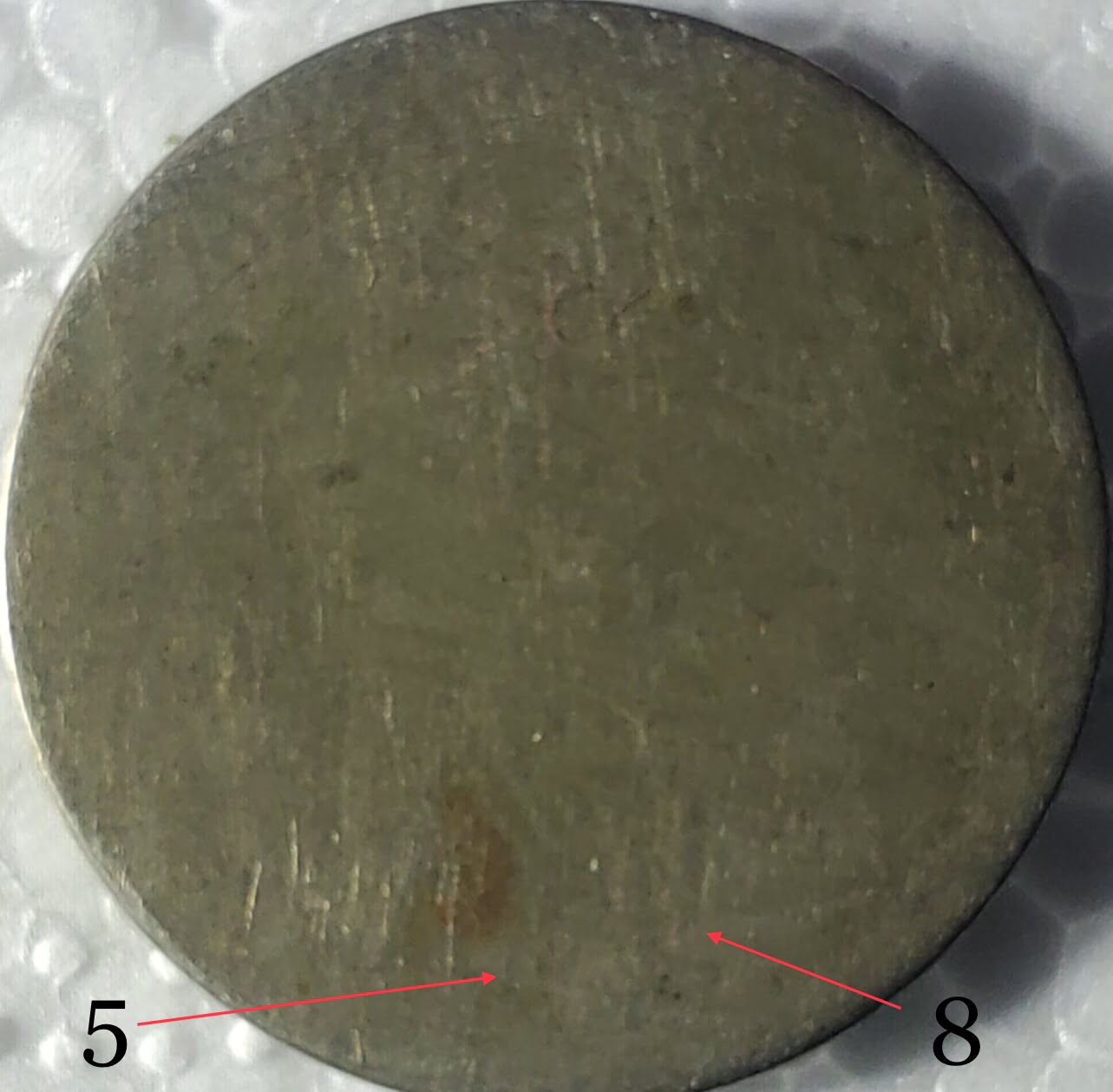 Is-There-Anything-Safe-That-Can-Be-Used-To-Bring-Out-Date-On-Worn-Coins?