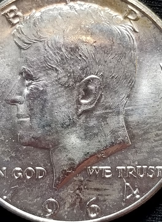 Wondering-What-This-Stuff-Is,-On-My-Silver-Half-Dollars