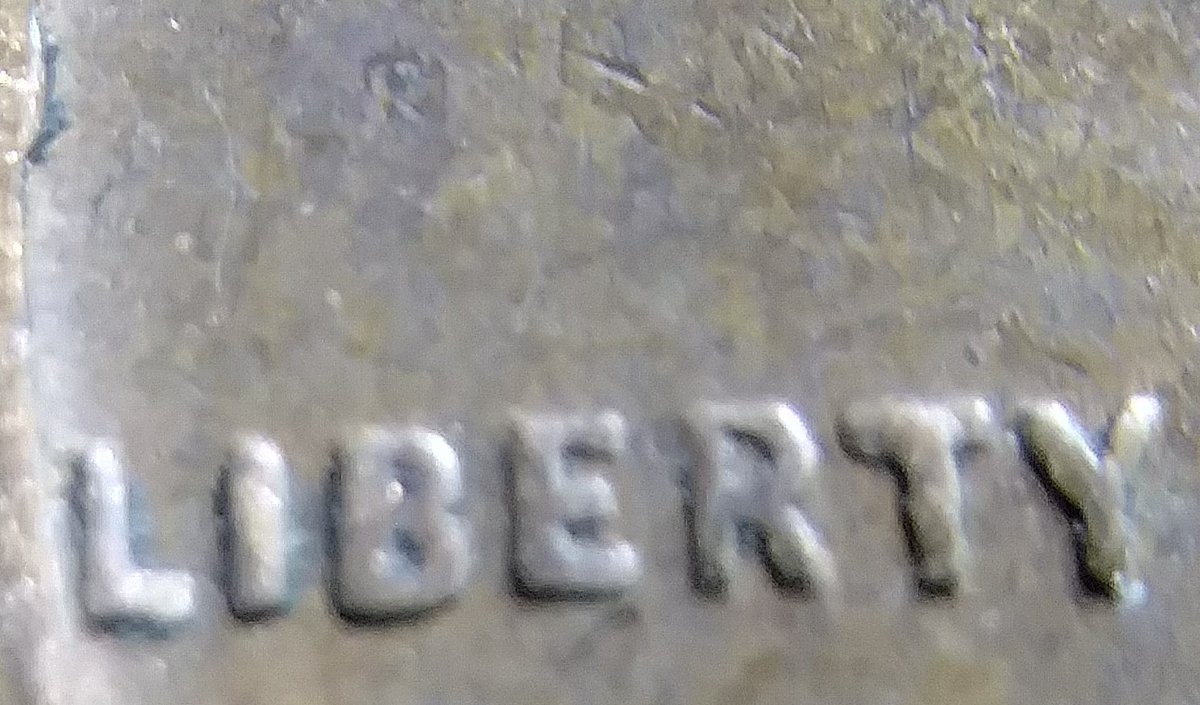 1937-Wheat-Penny-Struck-Over-Foreign-Coin?!