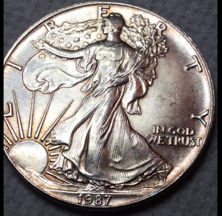1987-WLHd.-Extra-Fingers?-Letter-Under-S-In-Trust?-American-Silver-Eagle