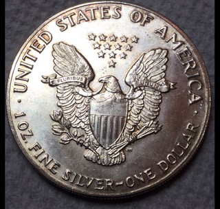 1987-WLHd.-Extra-Fingers?-Letter-Under-S-In-Trust?-American-Silver-Eagle