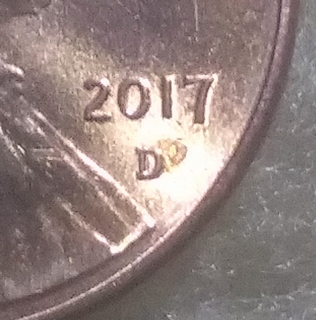 2014-Penny-With-Looks-Like-D-And-Large-Shadow-Of-D