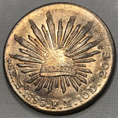 1885-Mexico-8-Reales-Cap-&-Rays