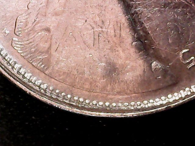 1975-Quarter-On-1966-5-Cents;-What?