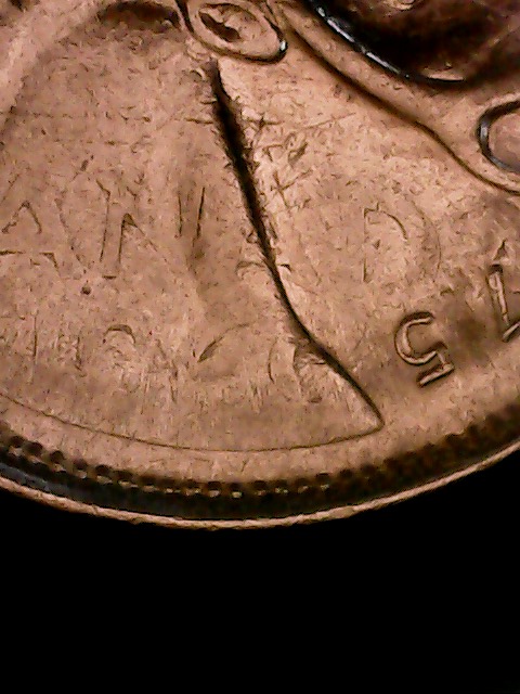 1975-Quarter-On-1966-5-Cents;-What?